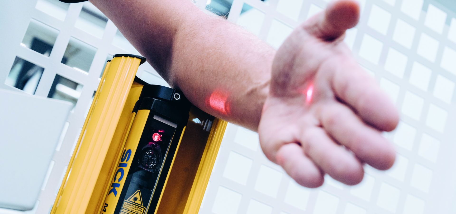 Hand approaching laser safety system