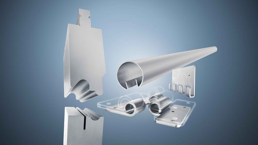 以 3D 方式呈现金属折弯下模和钣金加工模具,且背景采用蓝绿色