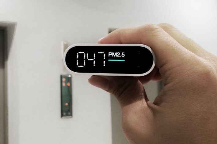 in door air quality check. measuring dust particles in the air. harmful PM 2.5 (particulate matter) small dirty dust harmful to health. unhealthy working environment in a building.