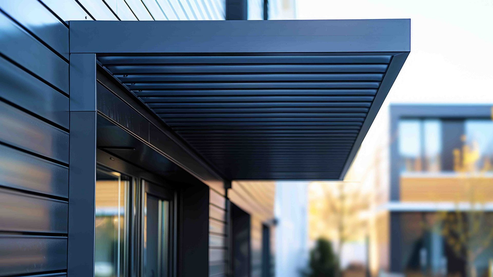 Modern building facade with a sleek awning.